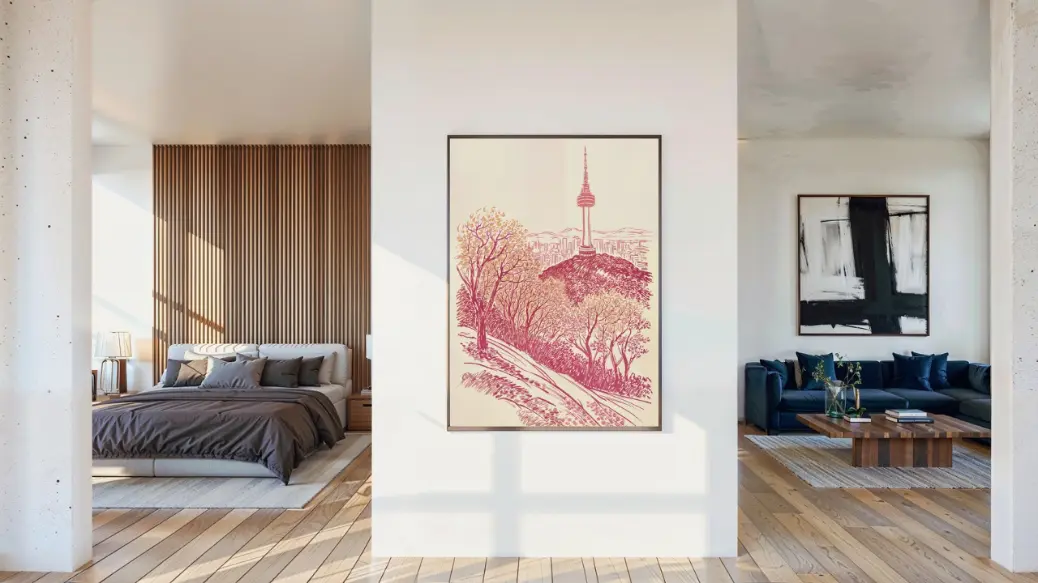 A person holding the 16x24 inch N Seoul Tower print before framing it. The image is shown in a well-lit room, emphasizing the art&#39;s large scale and vibrant, warm colors