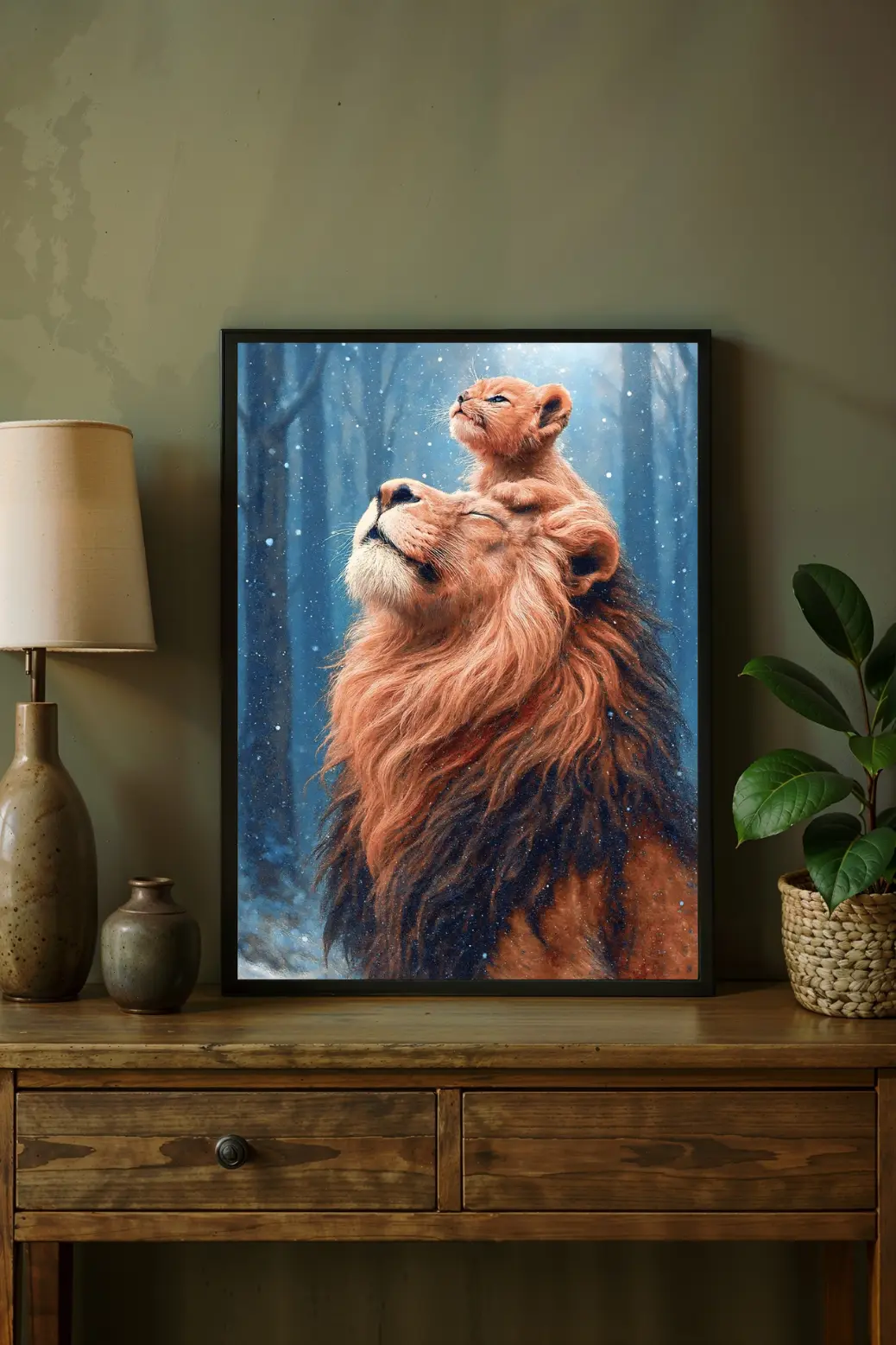 A styled wooden shelf displaying a smaller 8x12 inch framed version of the snowy lion print. The art is surrounded by winter seasonal decor elements like pinecones, a small evergreen branch, and a white candle. This image showcases the artwork's versatility as seasonal winter home decor, perfect for adding a festive yet sophisticated touch to an entryway, hallway, or mantelpiece during the holidays.